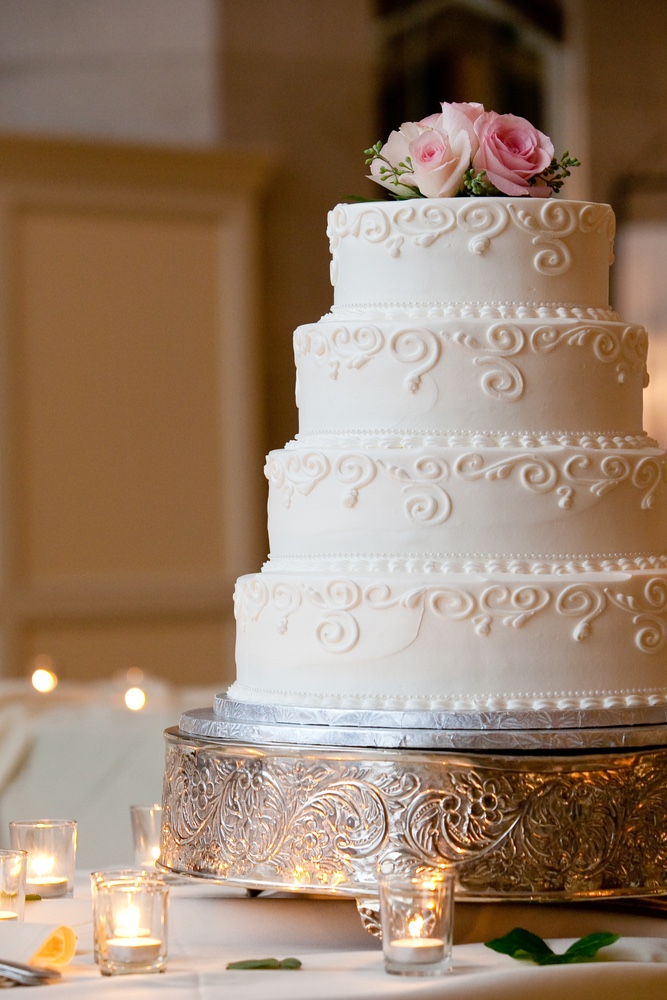 Sweet Fest discusses Cottage Food Laws. Article shows image of wedding cake.